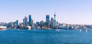 View of Auckland city from across the harbour, showing the skytower and viaduct